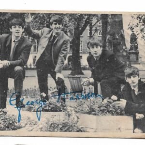FIGURITA DE LOS BEATLES N°1